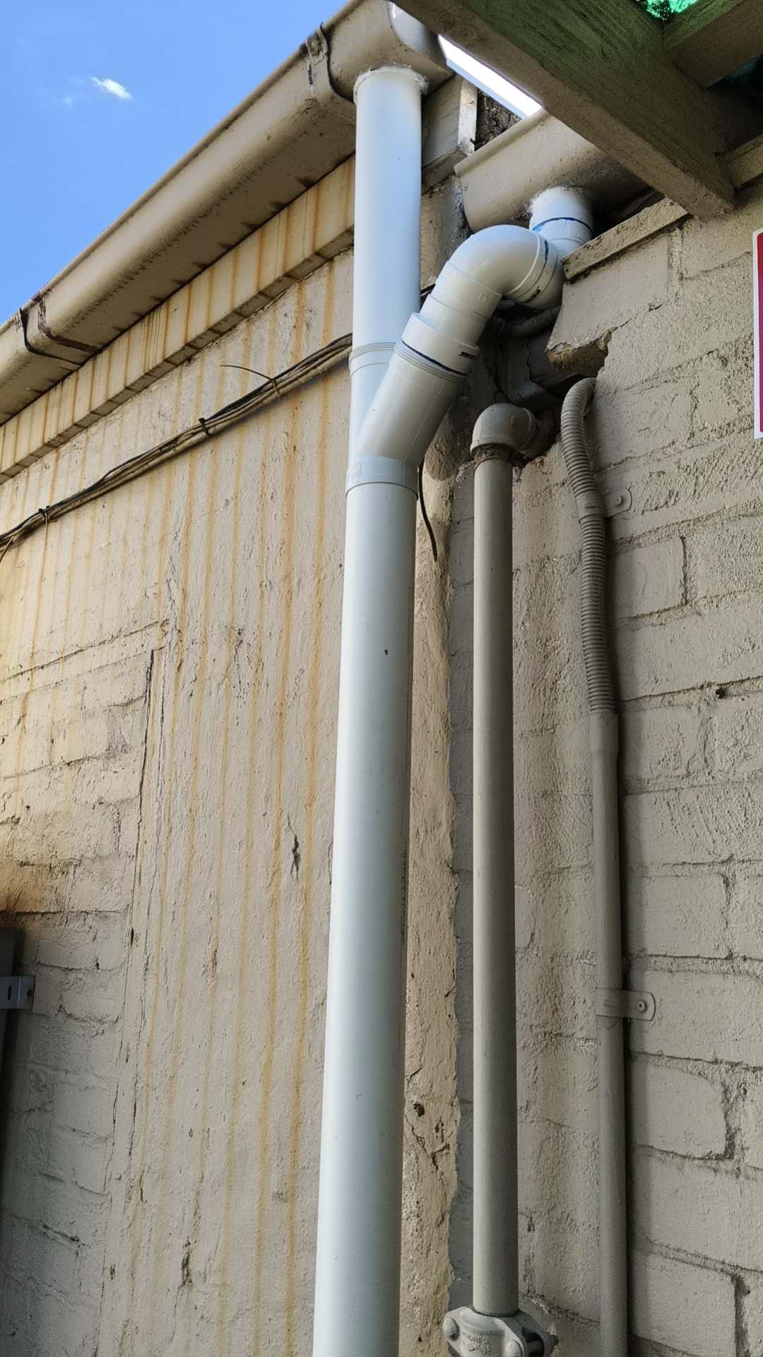 Close view of the completed upper exterior drainage connection