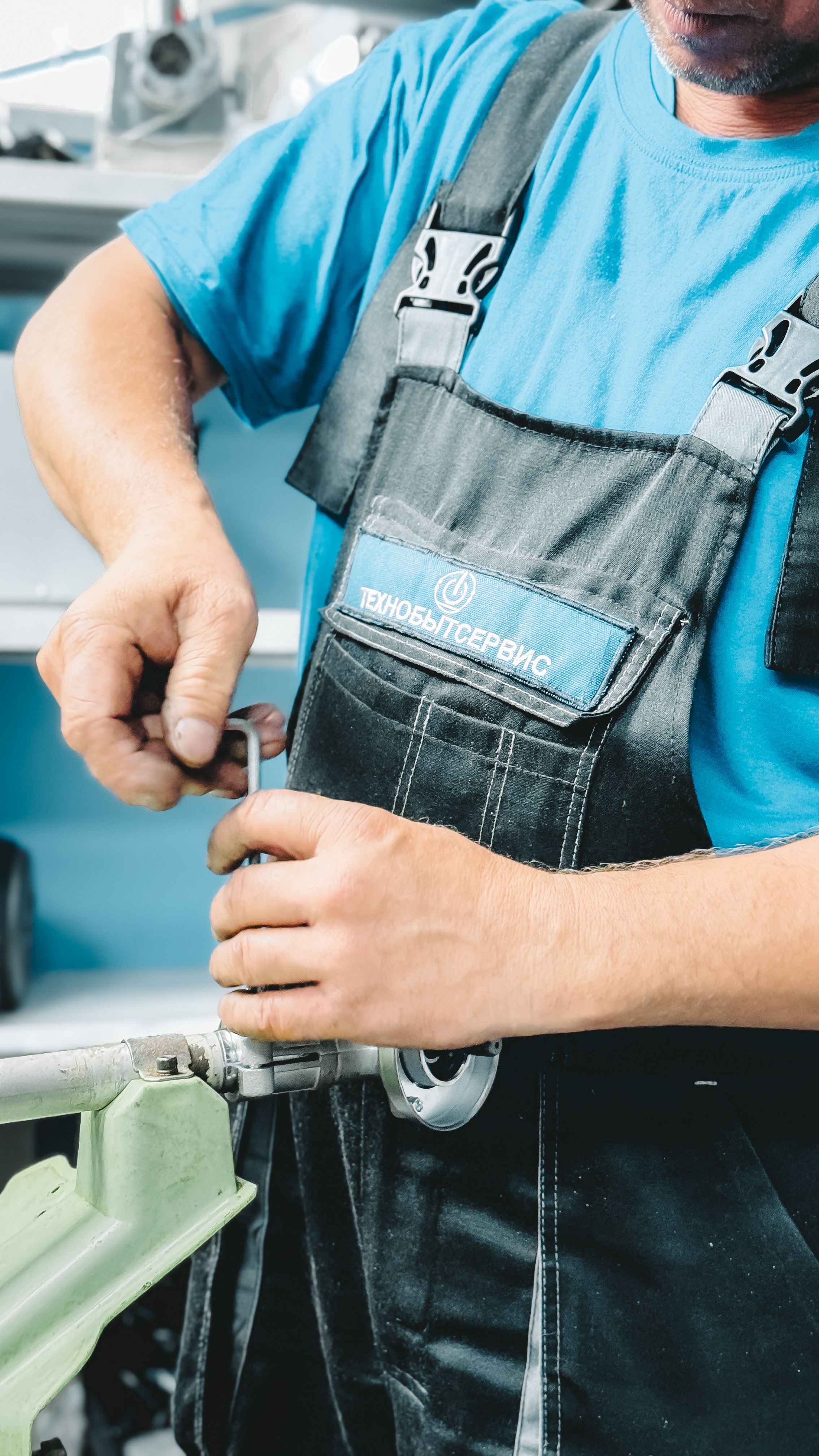 Tradesperson working on a pipe as a representative service image